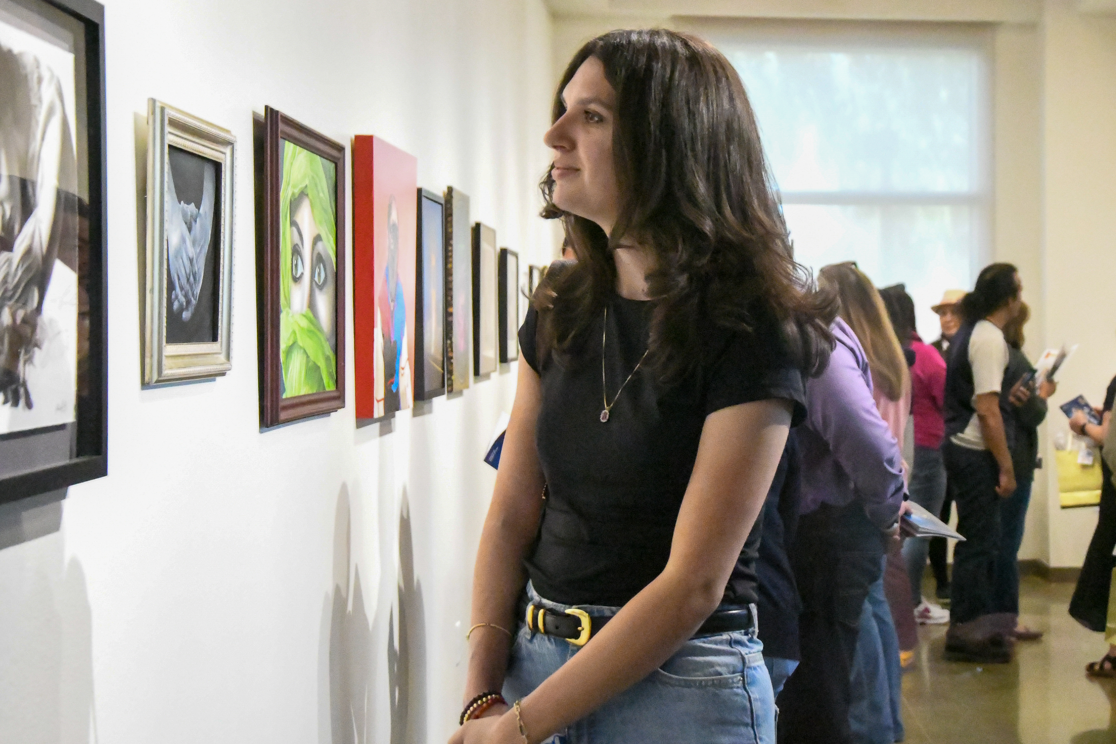 Attendees at art gallery exhibition