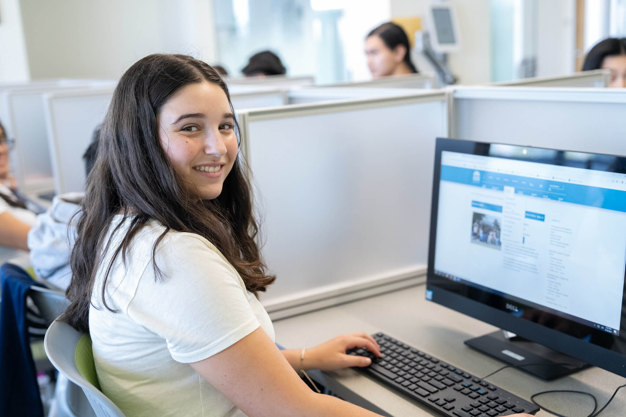 Mission College Student at a computer