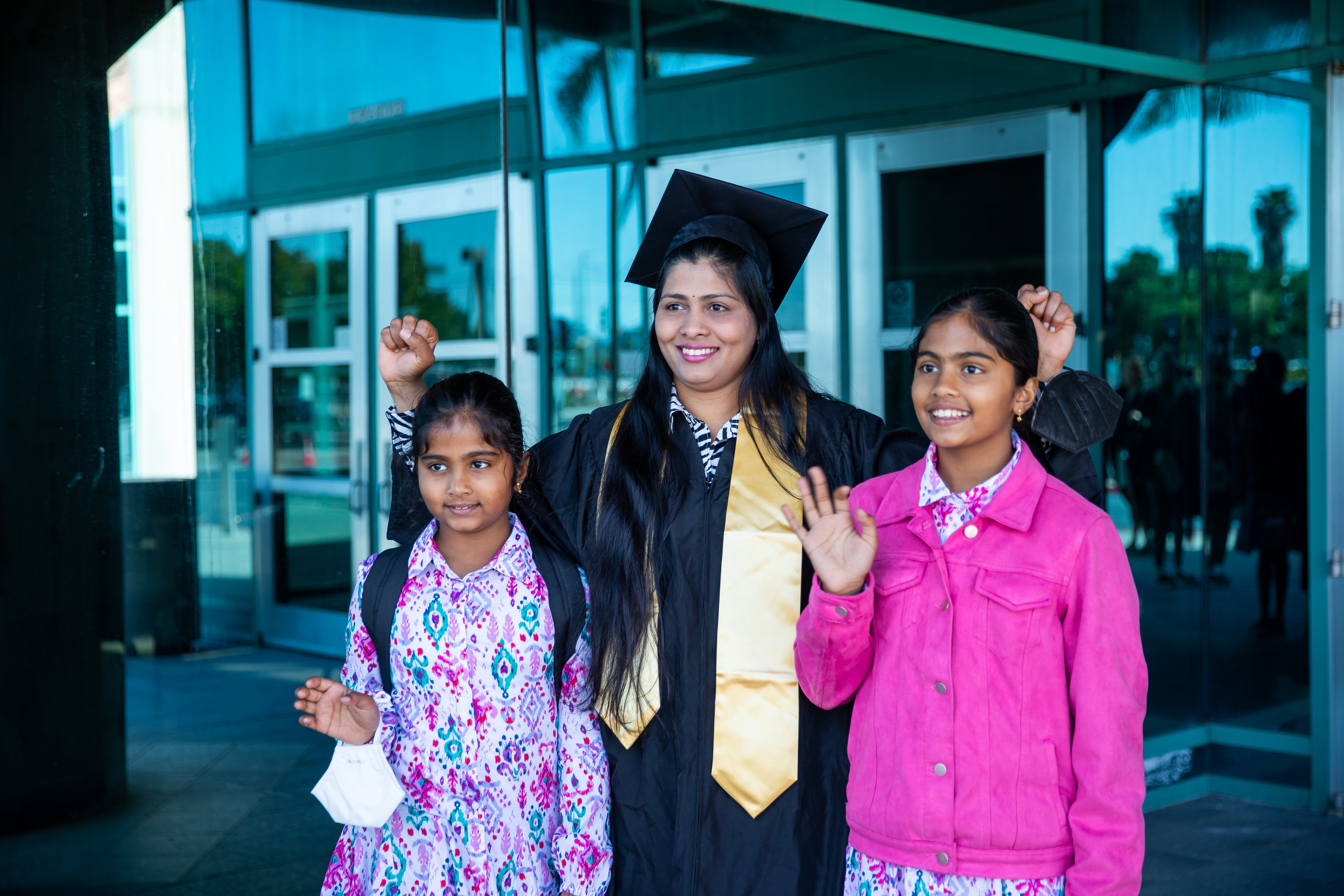 Graduating student with children